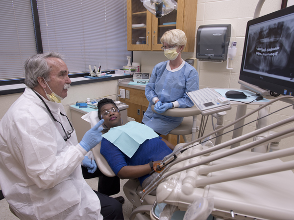 Felton sees patients one day per week in the school's clinical practice to ensure his skills stay up-to-date for teaching.