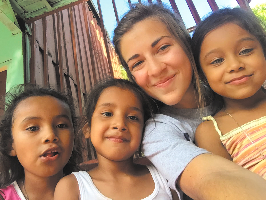 Meagan Henry bonds with the children of some patients in Nicaragua.
