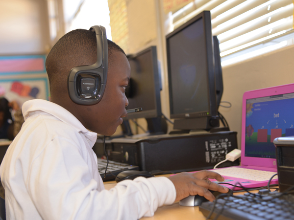 Raines Elementary first-grader D'Ashtyn Minor participates in his 30-minute tutoring session with the TutorMate program.