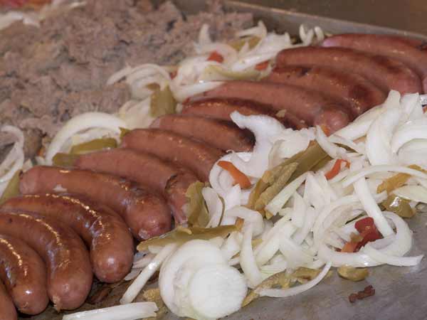 Healthy peppers and onions make a grilled sausage a good choice at the Fair.
