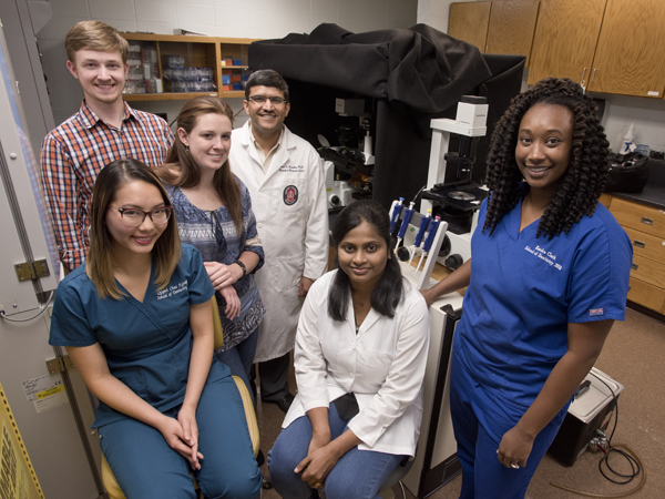 The Janorkar lab, front row from left: Quynh Chau Nguyen, D2; Gurumurthy; Kendra Clark, D3; back row from left: Jared Cobb, Ph.D student; Sarah Fitzgerald, Ph.D. student; Janorkar.