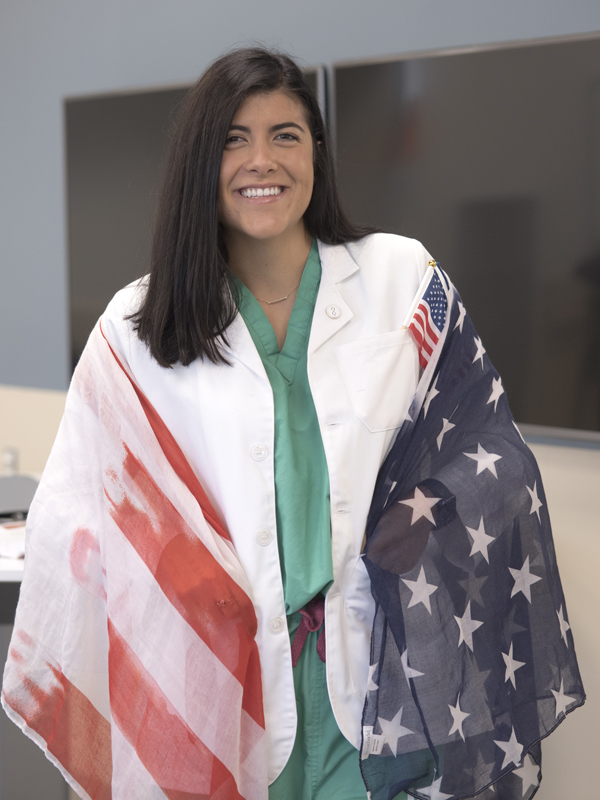 Among Sara's possessions that symbolize her newly adopted country is this scarf with a U.S. flag theme