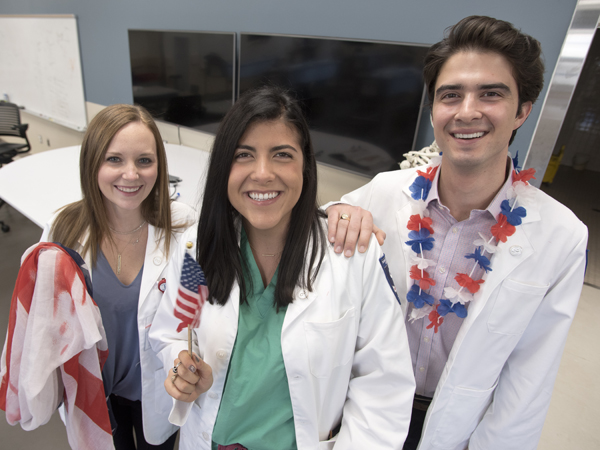 Among those who have celebrated Sara's U.S. citizenship are her friends and fellow M1s Kathryn Wegener, left, of Jackson and John Bobo of Clarksdale.