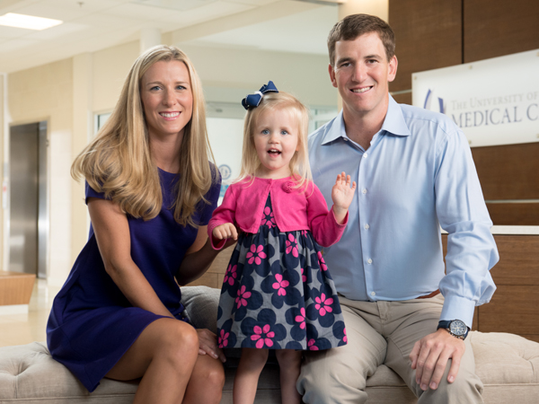 Abby and Eli pose with Batson heart patient Abigail Morgan.