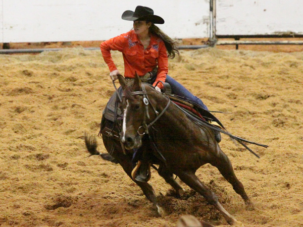 Dean says she's never loved a horse like she loves her mare, Remi, pictured above, but remains thankful for how much her horse Moose (Dual Playgun) taught her about penning. Photo courtesy of Charlette Robinson of Action Shots N More.