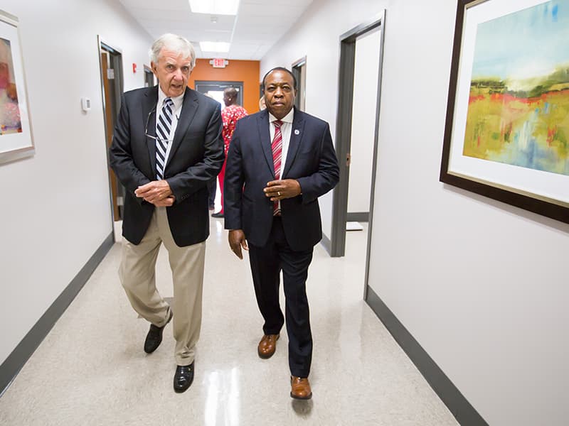 Humphreys County Board of Supervisors president Dickie Stevens and District 5 Supervisor Roy Broomfield tour the new UMMC Community Care Clinic.