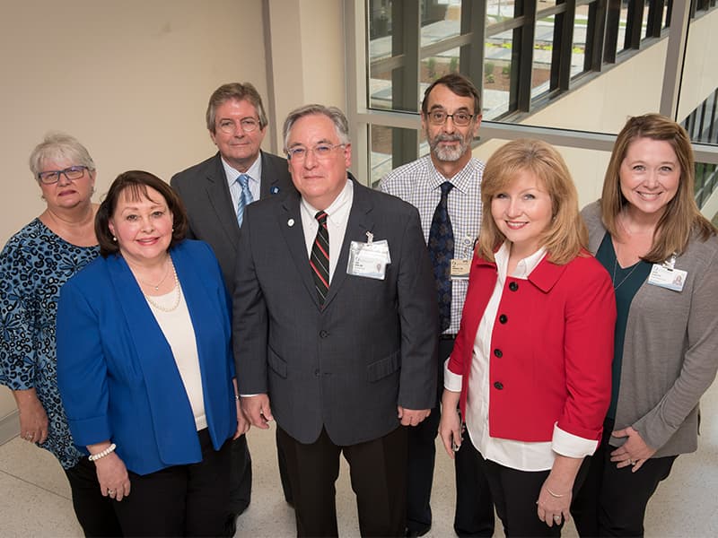Among those who worked on the SACSCOC Fifth-Year Interim Report are these key contributors, back row, from left: Dorothy Singleton, project manager; Dr. David Fowler, director of academic information systems; and Dr. Robin Rockhold, deputy chief academic officer; front row, from left: Dr. Mitzi Norris, executive director for academic effectiveness; Dr. Ralph Didlake, associate vice chancellor for academic affairs; Teresa Clayton, project administrator; and Dr. Natalie Gaughf, assistant professor, academic affairs.