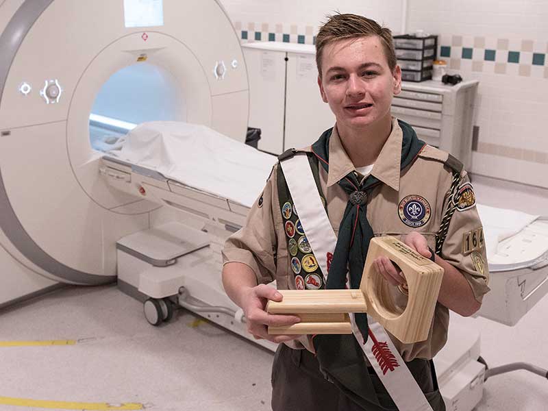 Robert Tickner of Madison shows his Eagle Scout project, a model MRI machine aimed at easing young patients' fears of imaging.