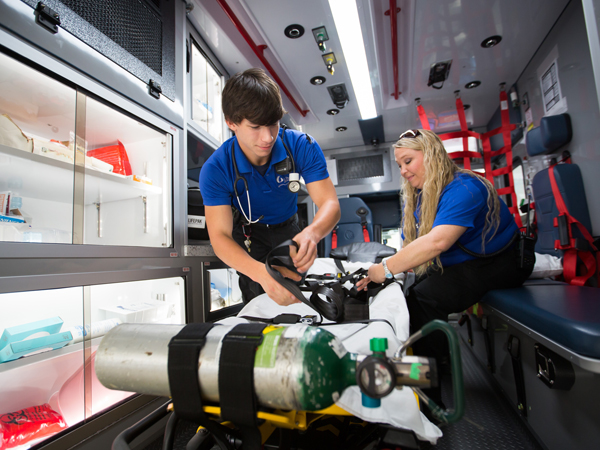 Davis and Windham reset one of UMMC Grenada's new ambulances after completing a patient transport.