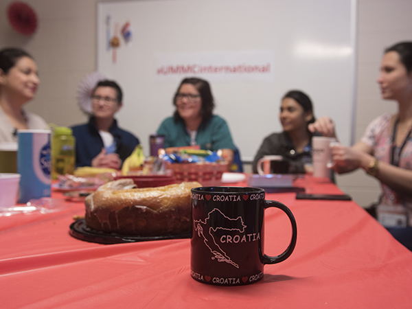 Environmentally conscious coffee hour attendees bring their own mugs to the meeting.