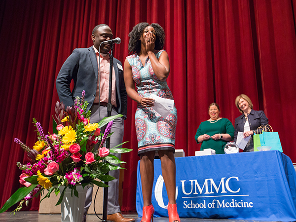 Kendra Courtney is overwhelmed by good news: She matches at the Medical Center -- her first choice -- in internal medicine-pediatrics -- also her first choice. Standing beside her, her husband Dr. Jeremy Courtney approves.