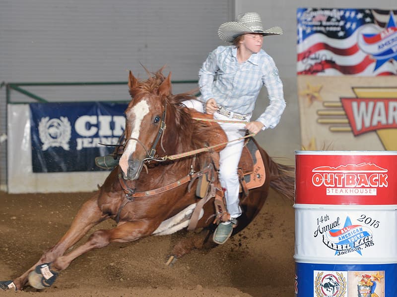 The late Carmen Smith of Louisville loved to compete in barrel racing and participated in the 2015 All-American Youth Barrel Race in Jackson. (Photo courtesy of Gina Smith.)