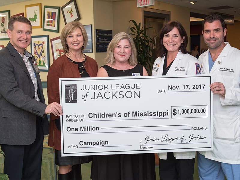 Celebrating the Junior League of Jackson's $1 million commitment to the Campaign for Children's of Mississippi are, from left, Children's of Mississippi CEO Guy Giesecke; Dr. LouAnn Woodward, vice chancellor for health affairs and dean of the School of Medicine; JLJ President Heidi Noel; Dr. Mary Taylor, interim chair of Pediatrics; and Dr. Brian Kogon, chief of pediatric cardiothoracic surgery.