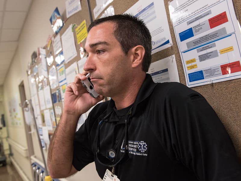 Jason Smith, manager of emergency services at UMMC’s Center for Emergency Services, kicks off a mass casualty drill with a call to Med-Com.