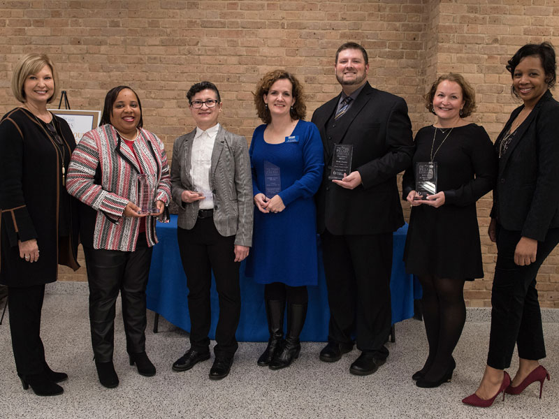 Pillars award winners honored by Dr. LouAnn Woodward, left, and Dr. Juanyce Taylor, right, include, from left, Dr. Gaarmel Funches, Dr. Norma Ojeda, Rev. Jill Barnes Buckley, Brent Necaise and Dr. Barbara Craft.