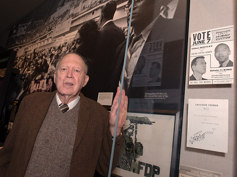 A display case, right, in the Mississippi Civil Rights Museum, holds a campaign poster from 1966, the year the Rev. Ed King ran against  John Bell Williams in the Mississippi Democratic primary for the position of Third District Congressman. On the poster, pictured above and to the right of King, is Ciifton Whitley, a U.S. Senate candidate. The text at the bottom left of the poster reads, 