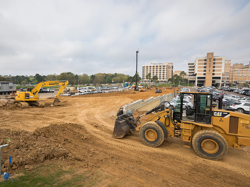 Construction of a new access road will connect East University Drive to Peachtree Street.