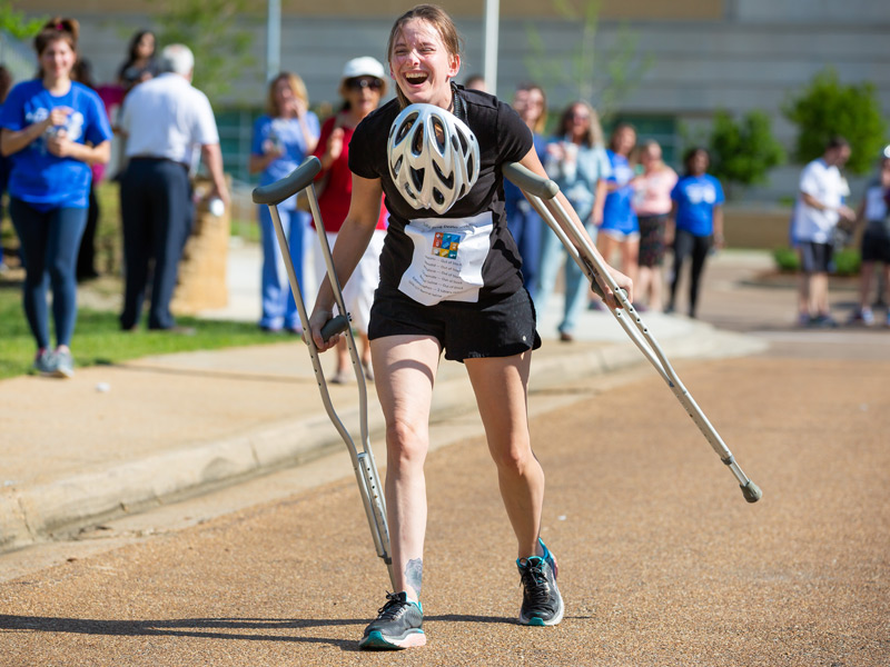 Legal Dealer team member is happy to see the finish line in sight.