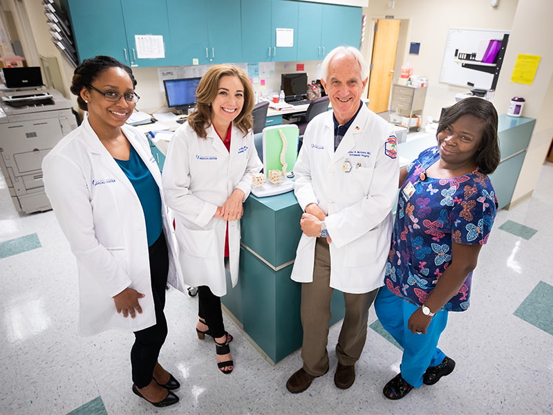 UMMC's Secondary Fracture Clinic team includes, from left, nurse practitioners Twyner and Janet Jolly, orthopedic surgeon Dr. Bob McGuire and medical administrator Olivia Morris.