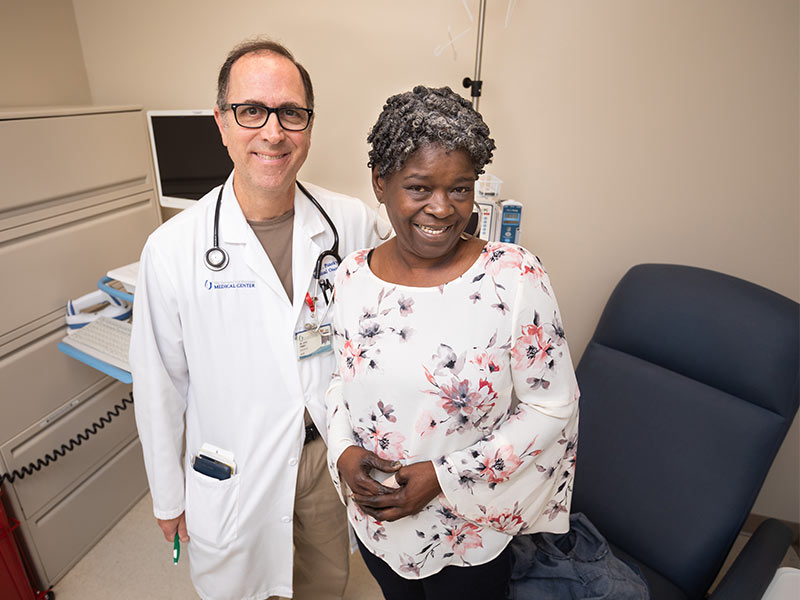 	 Dr. Louis Puneky is treating Linda Yassine of Jackson for colorectal cancer. She was diagnosed in 2007 at age 47 and says the ACS' new guidelines will save more lives.