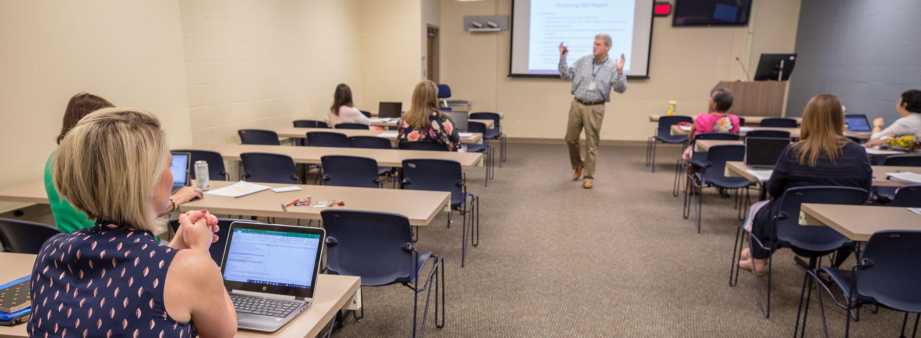 Dr. Christian Pruett demonstrates his teaching skills to the JBI representative from Australia.