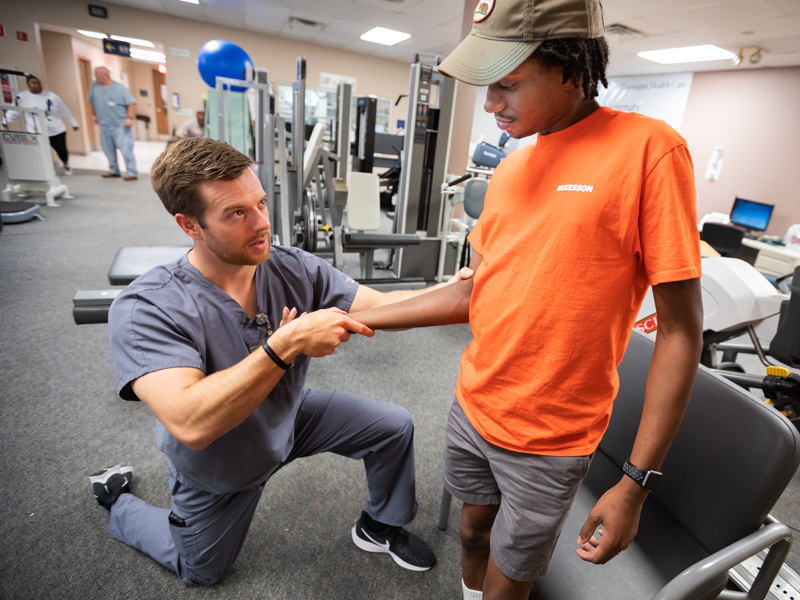 UMMC PT in the pros: Sports resident delivers care at Saints camp
