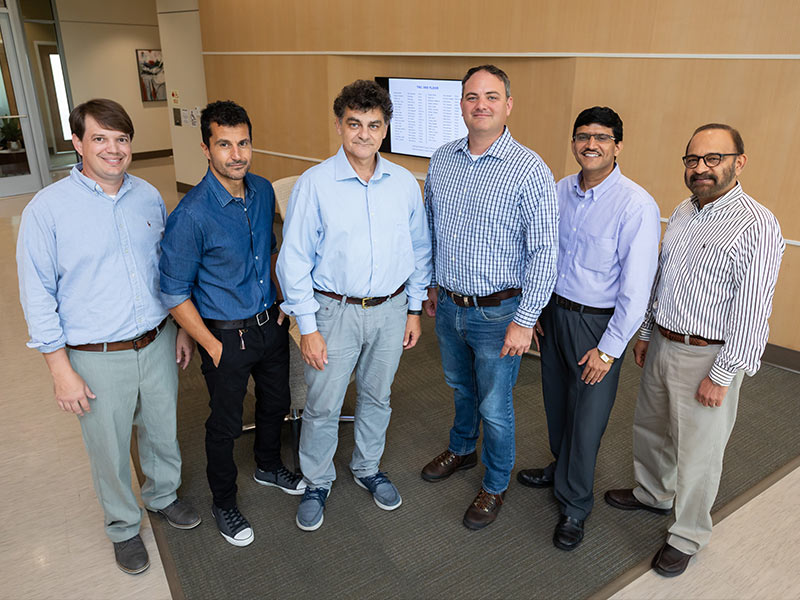 Among the several UMMC faculty using elastin-like polypeptides to study new ways to treat disease are, from left, Dr. Lee Bidwell, Dr. Alejandro Chade, Dr. Drazen Raucher, Dr. Eric George, Dr. Amol Janorkar and Dr. Parminder Vig.