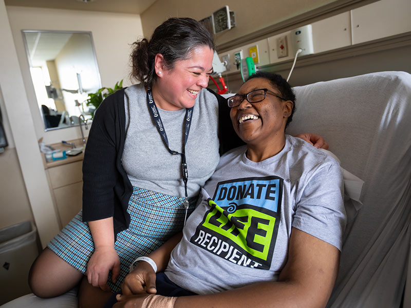 Dr. Felicitas Koller, left, and Kimberly Cooley are fast friends following Cooley's liver transplant.