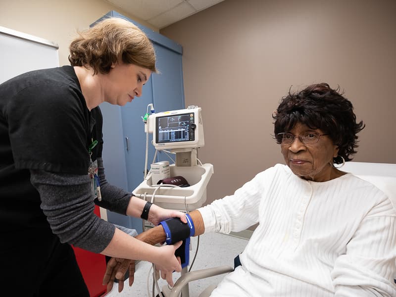 Lillie Rose Hines of Braxton has her blood pressure measured by Pamela Burleson, nurse, at the Medical Center.