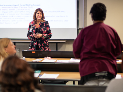 Class leader Elizabeth Franklin, center, listens as Jessica Eglin, and administrative assistant in the Department of Pediatrics, shares her "elevator speech" with the Preparing for Success class.