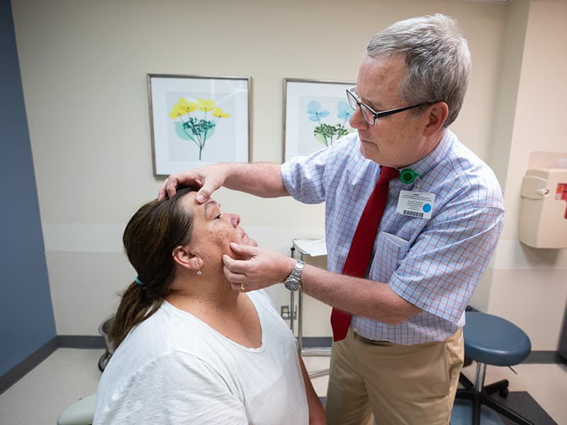 Brodell with patient, Kim Ross