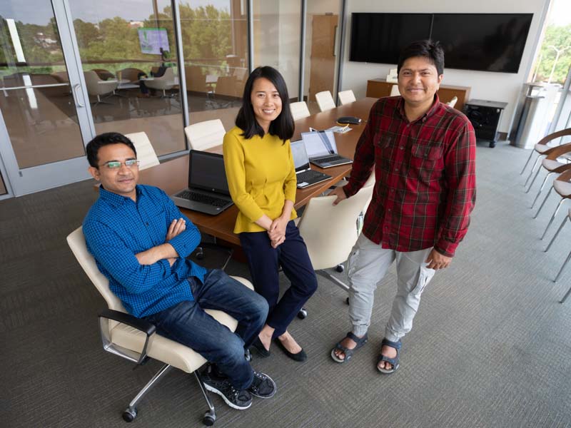 The first three graduates from UMMC's newest school, the John D. Bower School of Population Health, Md. Mohiuddin Adnan, Xiaoqian Zhu and Shamsed Mahmud.