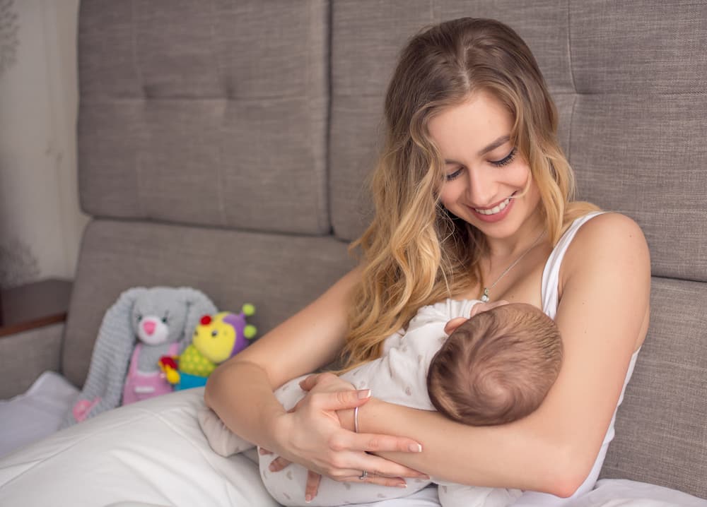 Mother breastfeeding baby.