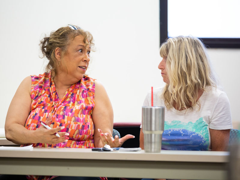 Lu Williams of Jackson, left, and Lynn Hulett of Florence talk during a recent support group meeting.