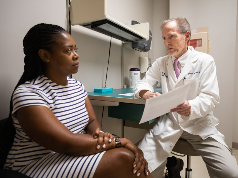 Victoria Louisville of Brandon is among the patients Dr. Joe Maher sees in his clinic at the Jackson Medical Mall, also the clinical site of the new Division of Medical Genetics and Precision Medicine, which he directs.