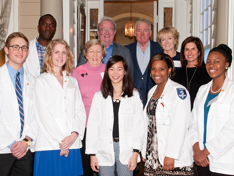 A group of Barksdale Scholars photographed with Barksdale family members in November 2014 before the students became physicians includes Dr. Hadley Pearson. Those pictured are, from left, front row: Dr. Alex Mullen, Pearson, Dr. Cathy Chen Mullen, Dr. Gaylen Patterson and Dr. Gabrielle Rattliffe; back row, from left: Dr. Michael Chiadika, Mary Sue Mitchell, Dr. Don Mitchell, Jim Barksdale, Donna Barksdale and Jane Anna Barksdale.