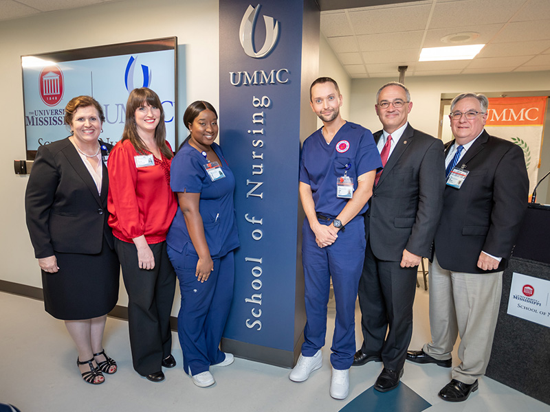 Helping to celebrate the opening of the School of Nursing Oxford's location are, from left, Dr. Julie Sanford, School of Nursing dean; Dr. Eva Tatum, SON Oxford nursing director; Hajja Bah and Chandler Craig, SON students; Larry Sparks, University of Mississippi interim chancellor; and Dr. Ralph Didlake, UMMC associate vice chancellor for academic affairs.