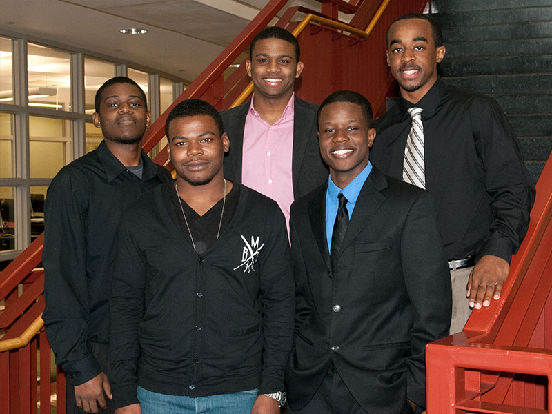In this archived photo, members of HELI’s first cohort, including Lindsey and Funches, pause between sessions during the early days of the program.