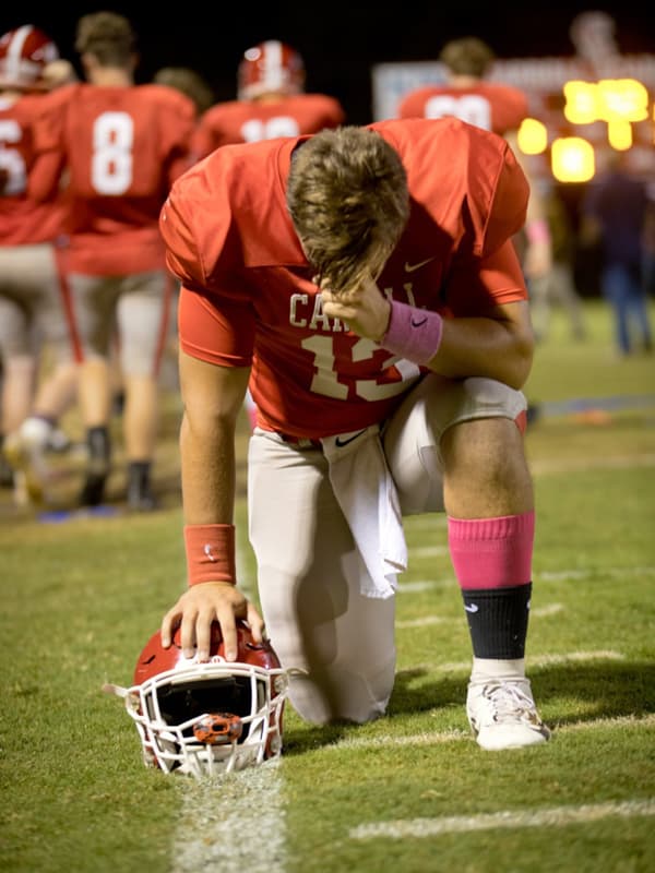 John Marc O'Cain changed his jersey number to his sister's lucky number 13 for the 2019 football season at Carroll Academy.