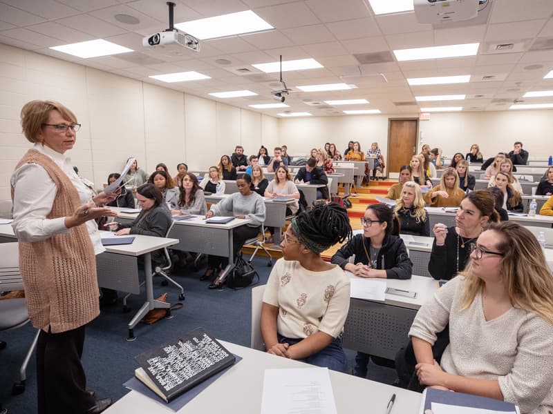 Assistant professor Dr. Kathleen Rhodes speaks to incoming students about the accelerated program during their orientation in November.