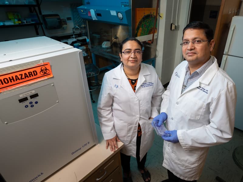 Dr. Ritesh Tandon, right, UMMC associate professor of microbiology and immunology, and Poonam Sharma, a UMMC Ph.D. student, will be studying the effects of space radiation on human cytomegalovirus.