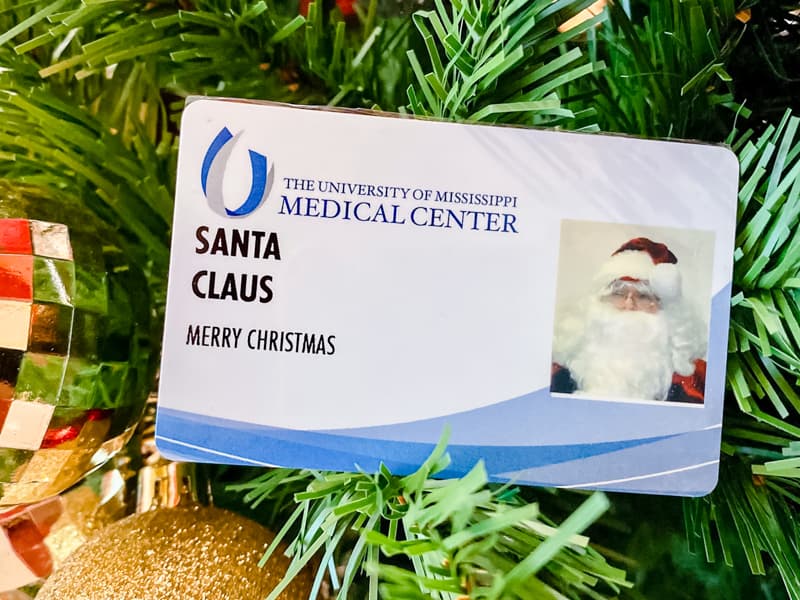 Santa Claus has become such a popular figure at the gingerbread village competition that he has his own UMMC ID badge.