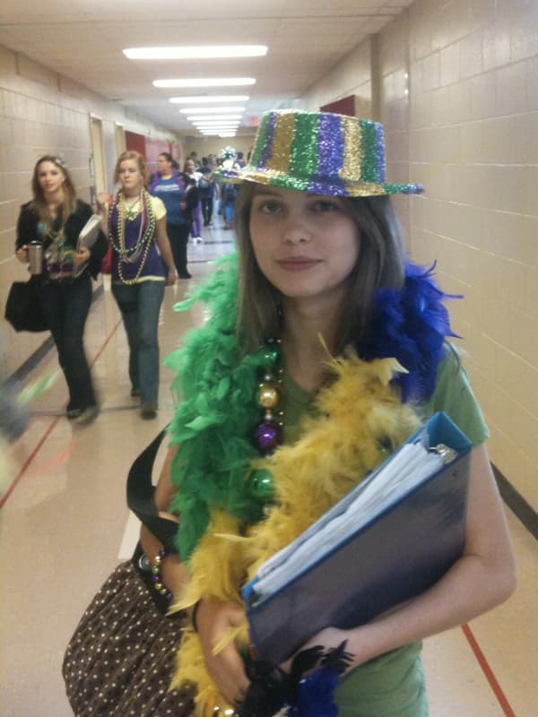 In this photo taken several years ago, Lexi Griffith roams the corridors of Florence High School as an 11th grader in Mardi Gras mode.