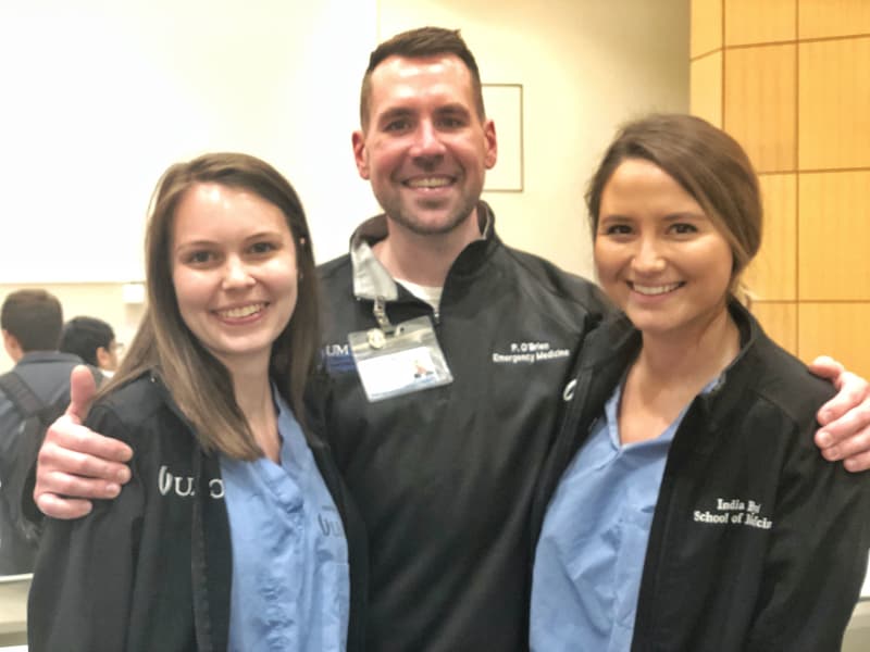 At UMMC, Patrick O'Brien has discovered several of his former high school students working or studying here, including Lexi Griffith, left, and India Byrd Hemphill, right.