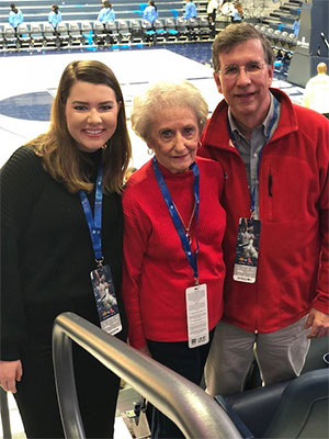 Photo of tucker with his mother and daughter.