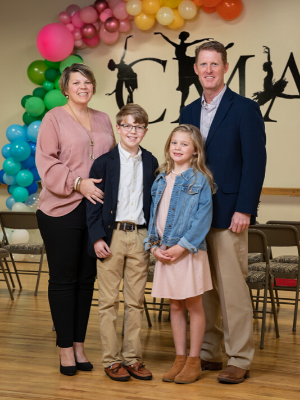 Tara Cumberland, shown here with son Davis, daughter Sybil and husband Jason, said COVID-19 precautions taken by the community help her children stay healthy.