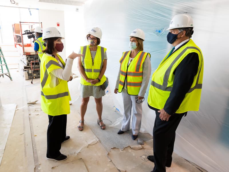 Dr. Mary Taylor, left, and Dr. LouAnn Woodward, second from right, UMMC vice chancellor for health affairs, discuss the children's hospital expansion with Jerry Host, Trustmark chairman and CEO, and his wife, Olivia.