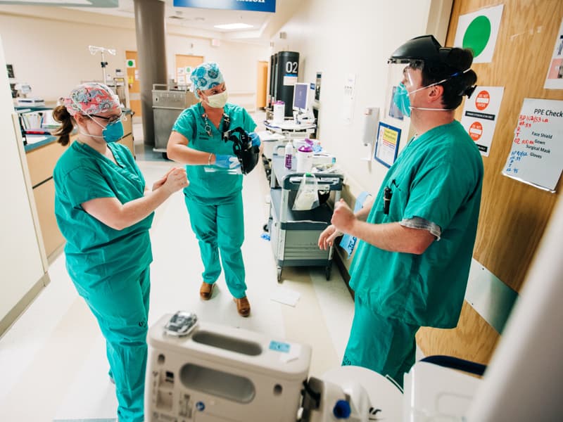 UMMC is joining a $54 million COVID-19 study that will look at epidemiological trends in patients and health care workers. This will include surveys on PPE usage that are being used by Heidi Logan, left, Lisa Noel and Jacob Ellett, nurses on 2 North.