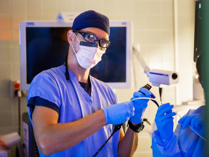 Dr. Michal Senitko uses a bronchoscope to perform a lung volume reduction during a minimally invasive procedure.