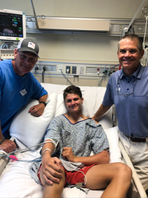 During his hospitalization, Jack Houston got a visit from Madison Central High football coaches.